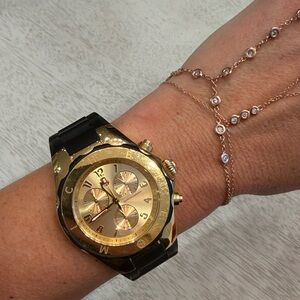 Michele black and gold watch